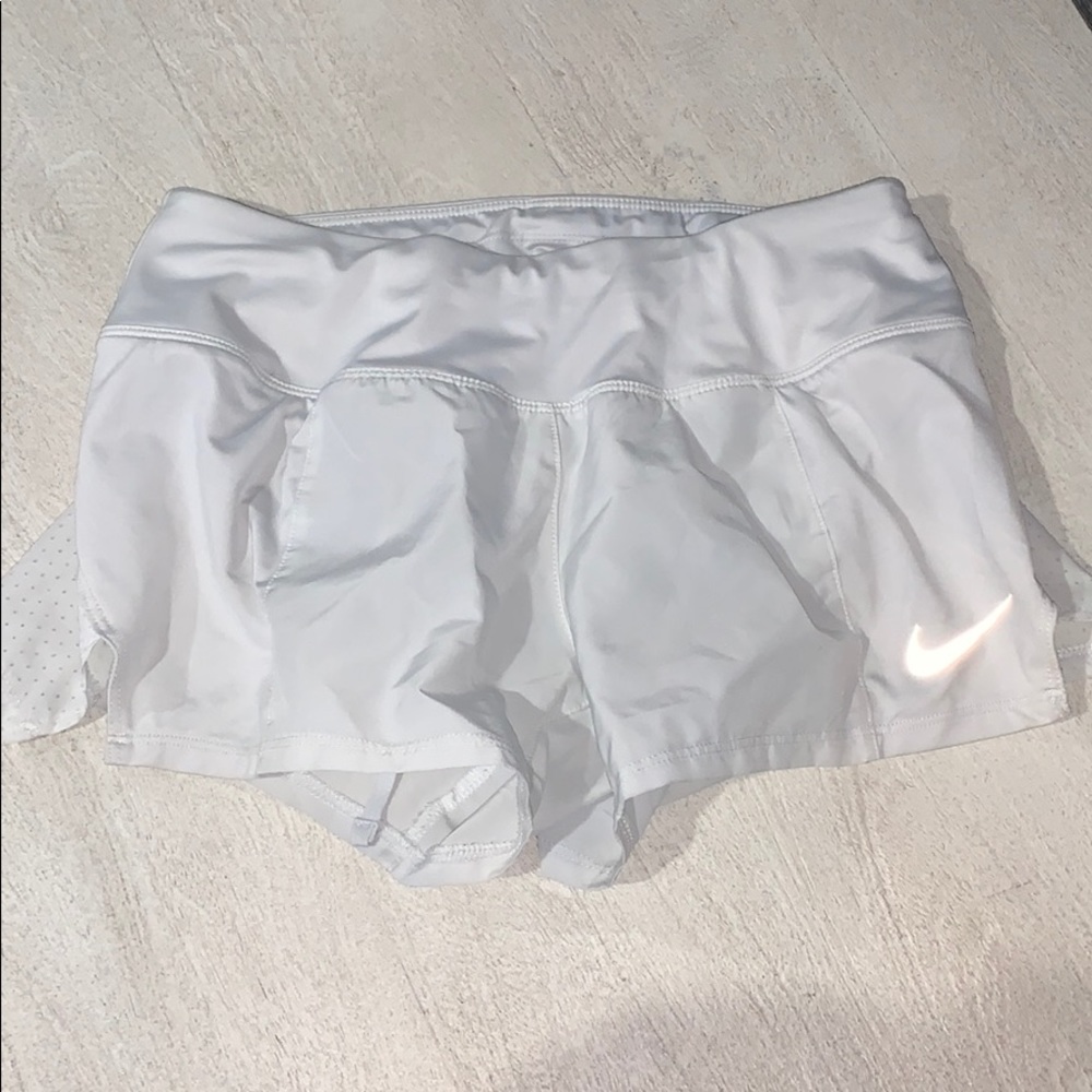 White Nike shorts